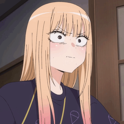 Blonde Girl in Black Shirt With Triangle