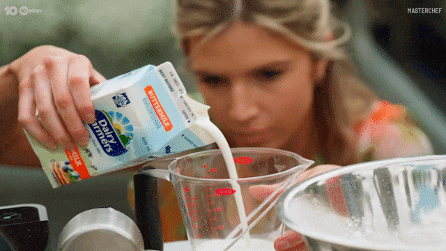 Blonde Girl Water Pouring Milk GIF