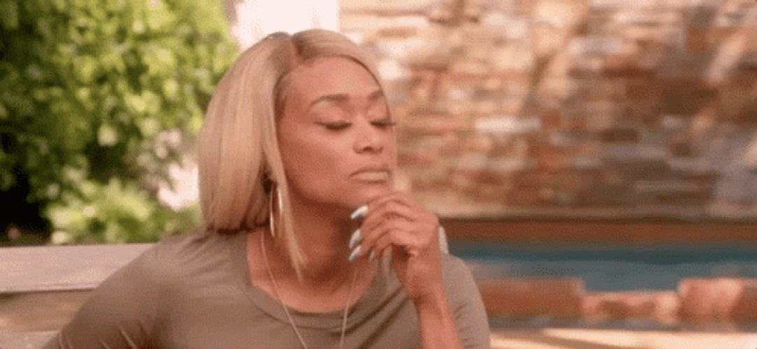 Blonde Lady Nodding While Closing Her Eyes GIF