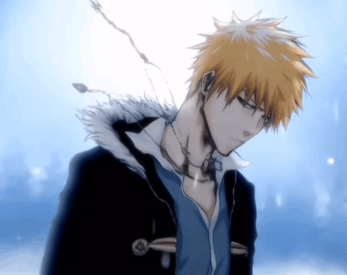 Blonde Man in Black Jacket With Fur Hood