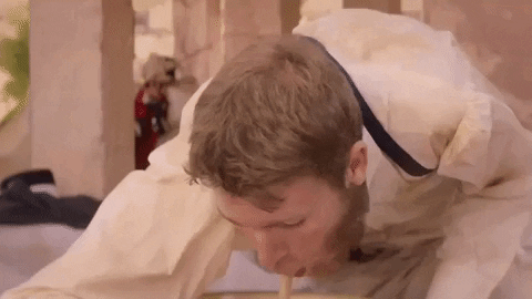 Blonde Man Puking To Bowl GIF