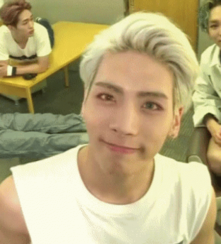 Blonde Man Smiling With Others