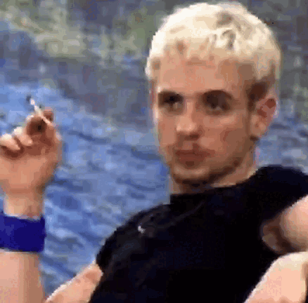 Blonde Man Smoking Cigarette GIF