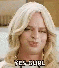 Blonde Man Wearing Wig Making Funny Face