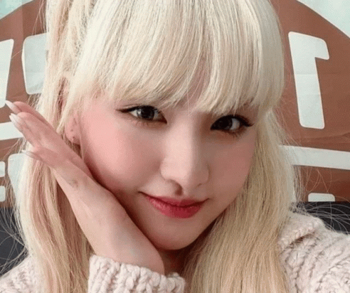 Blonde Woman Hand on Face Sign Says T