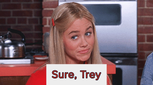 Blonde Woman Holding Sure Trey Sign
