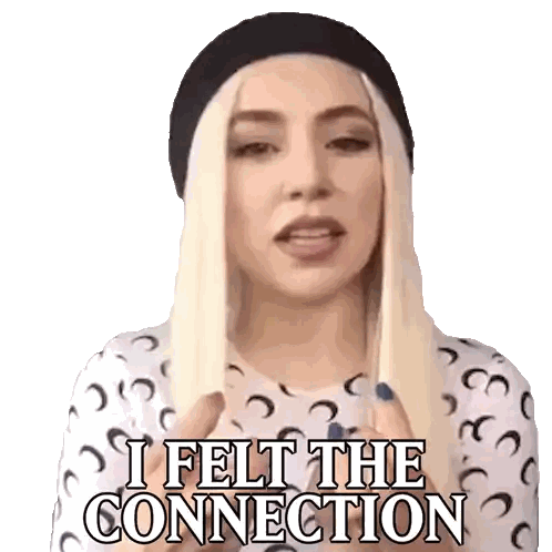 Blonde Woman in Black Hat and White Shirt Saying I Felt the Connection
