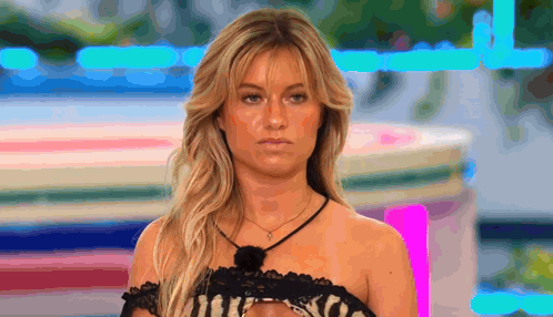Blonde Woman In Black Lace Top And Necklace GIF