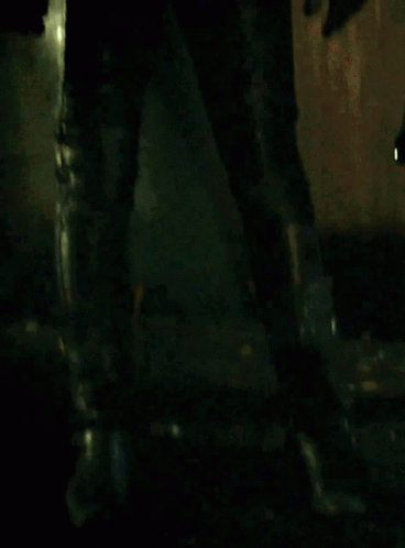 Blonde Woman In Black Mask And Leather Jacket GIF