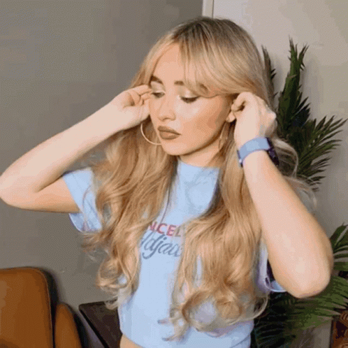 Blonde Woman in Blue Shirt Saying Cancel All Your Plans