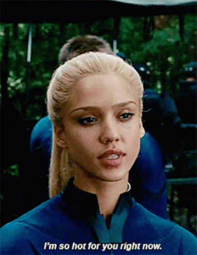 Blonde Woman In Blue Suit Says I'm So Hot For You Right Now GIF