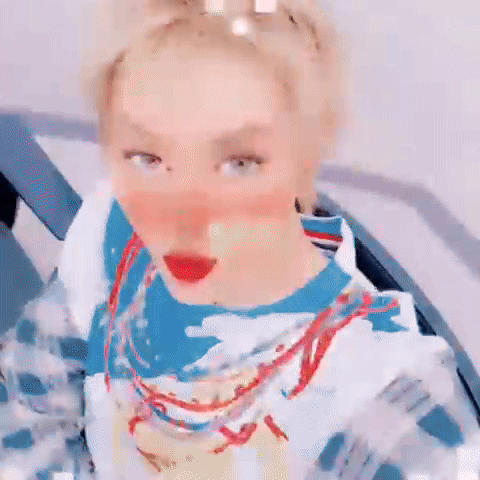 Blonde Woman in Blue White Shirt With Necklace