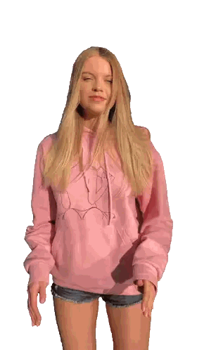 Blonde Woman in Pink Hoodie with Drawing