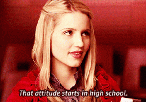 Blonde Woman In Red Coat Says Attitude Starts In High School GIF
