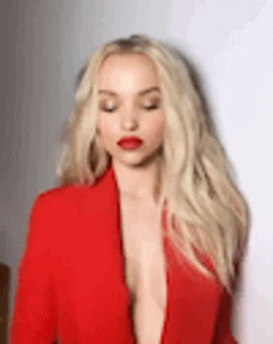 Blonde Woman in Red Jacket and Lipstick