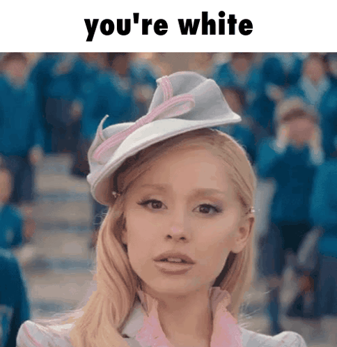 Blonde Woman in White Hat Saying You're White