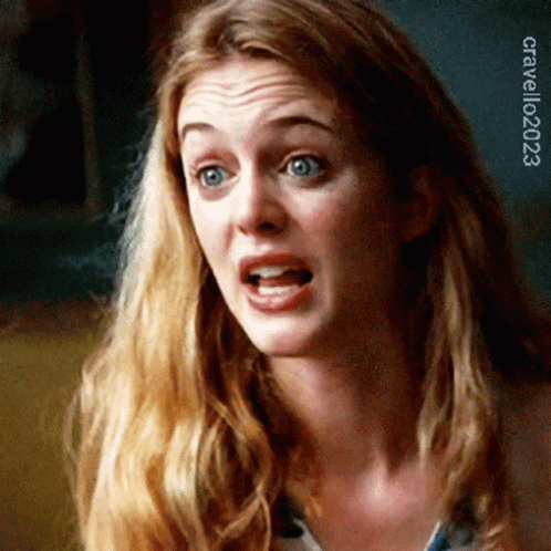 Blonde Woman Making Funny Face With Mouth Open