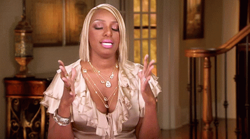 Blonde Woman Plunging Neckline Eyes Closed Hands Up GIF