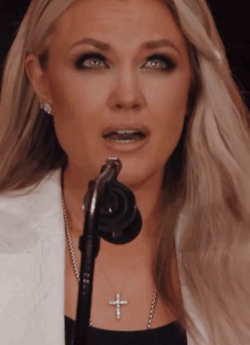 Blonde Woman Singing Into Microphone GIF