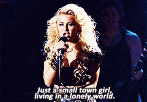 Blonde Woman Singing Just A Small Town Girl GIF