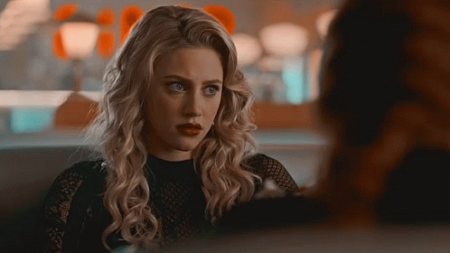 Blonde Woman Sitting With Another Woman GIF