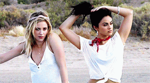 Blonde Woman Sitting With Another Woman GIF