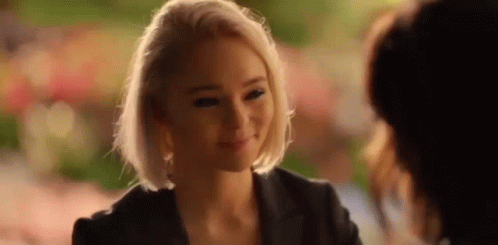 Blonde Woman Smiling At Another Woman GIF