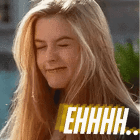 Blonde Woman Smiling Eyes Closed Saying Ehhhh