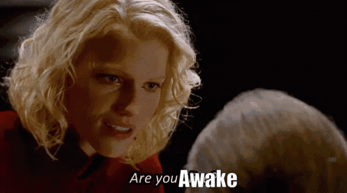 Blonde Woman Talking to Another Woman Are You Awake