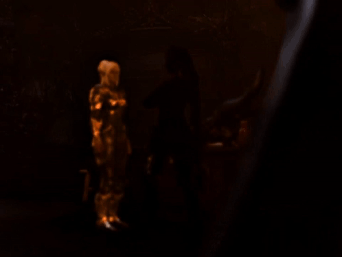 Blonde Woman Wearing Gold Armor