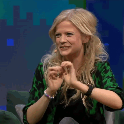 Blonde Woman Wearing Green Shirt and Ikea Watch