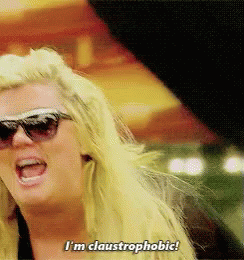 Blonde Woman Wearing Sunglasses Says Claustrophobic GIF