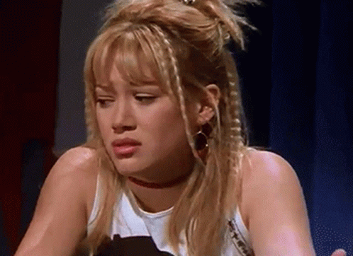Blonde Woman with Choker Making Face