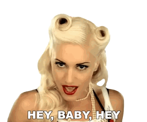 Blonde Woman with Pearls Saying Hey Baby