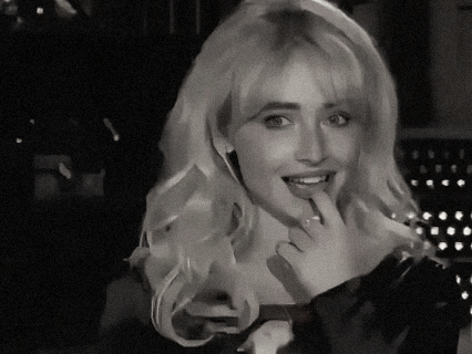 Blonde Woman With Ring GIF