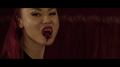Blood Dripping Vampire Woman GIF