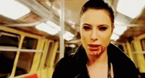 Bloody-Faced Woman Black Eyes Riding Train