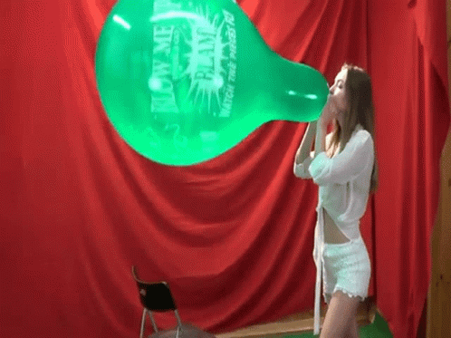 Blowing Up Green Balloon Pop GIF