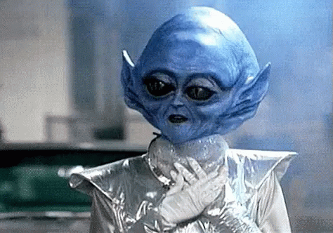 Blue Alien in Silver Costume