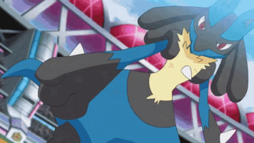 Blue and Black Pokemon With Red Eyes and Yellow Tail