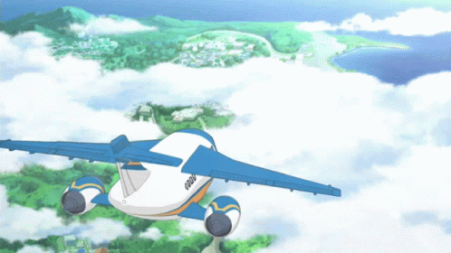 Blue and White Airplane Flying Over Green Landscape