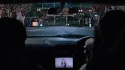 Blue and White Car Driving at Night