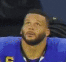 Blue and Yellow Football Player 99 Celebrating Touchdown