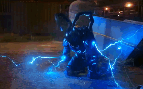 Blue Beetle Descending From The Sky GIF