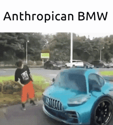 Blue BMW Parked Beside Man