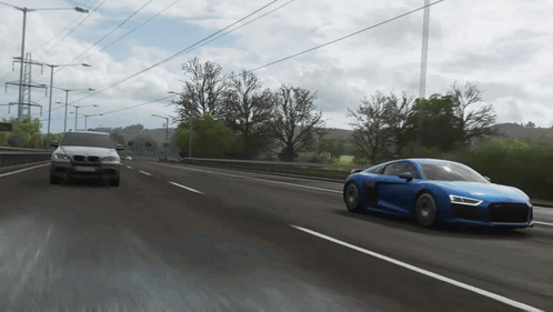 Blue Car Driving Highway, White Car Behind
