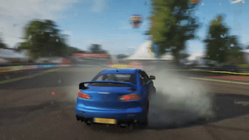Blue Car Driving Past Trees Hot Air Balloon GIF