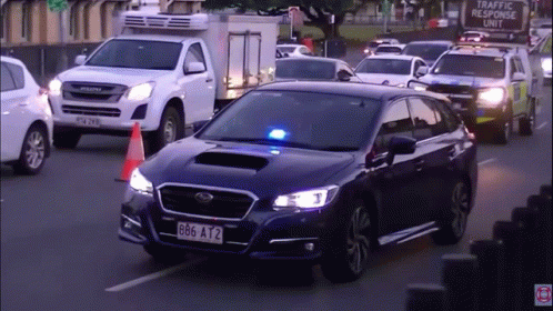 Blue Car With License Plate 666 AT2 Driving