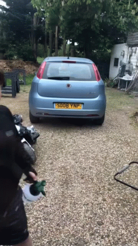 Blue Car With License Plate S908 YNP GIF