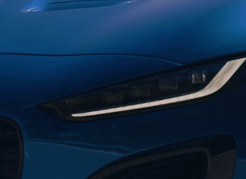 Blue Car With License Plate SBG 894 Driving